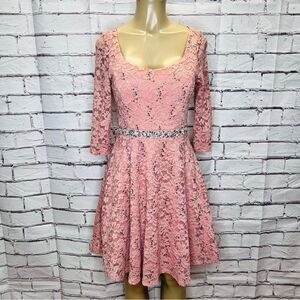 La Scala pink lace dress with a rhinestone  waist size medium